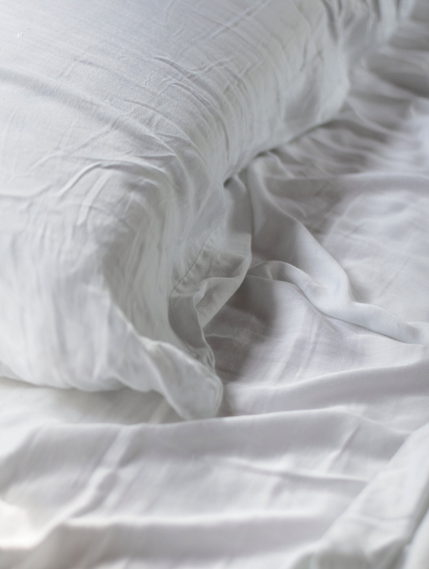 white sheets and pillow